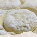 Golden brown butter biscuits on a baking tray