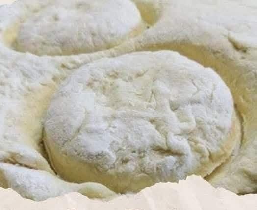 Golden brown butter biscuits on a baking tray